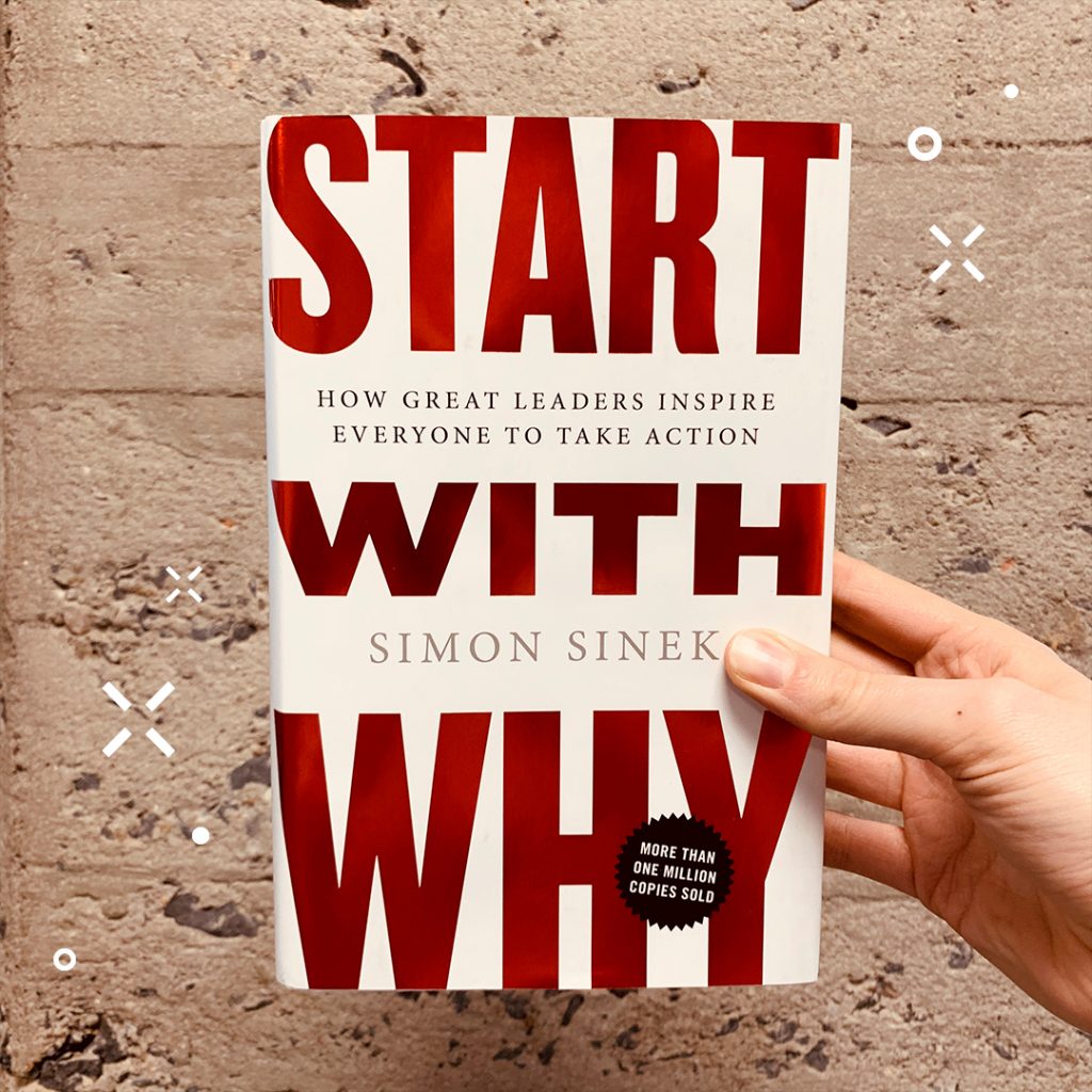 Photographie du livre Start With Why devant un mur de béton