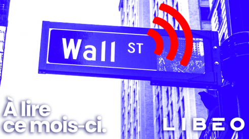 Logo de Libéo devant un panneau indiquant la rue Wall Street