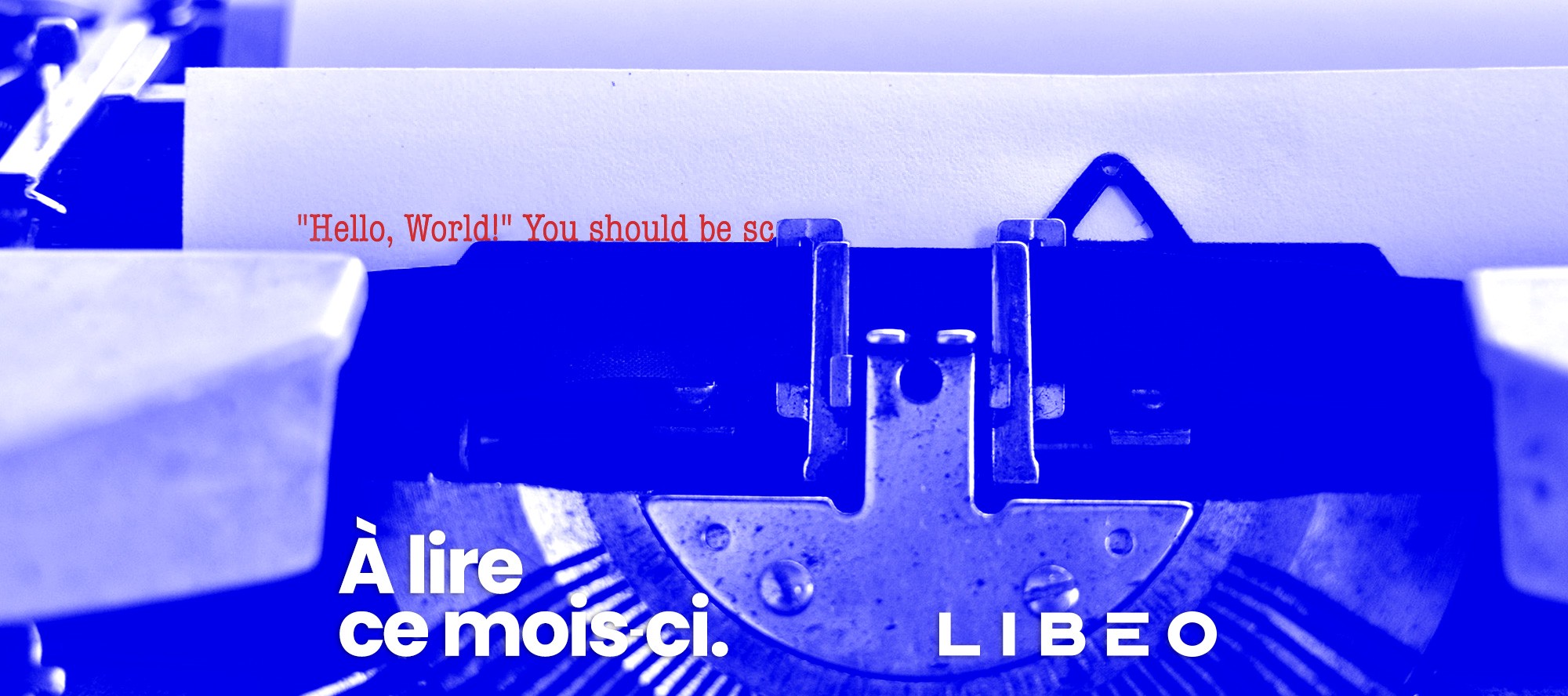 Logo de Libéo avec une machine à écrire en bleu